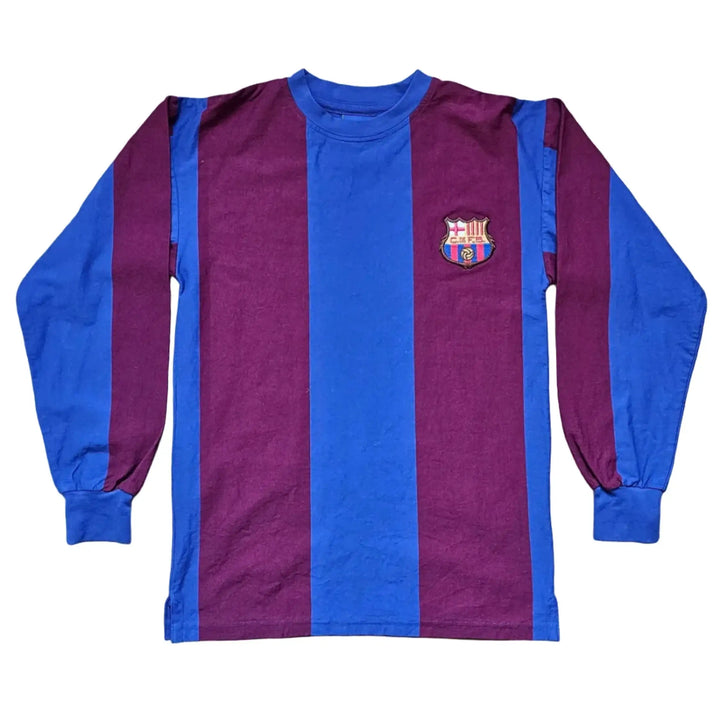 Back view showing FC Barcelona crest and vertical red and navy stripes.