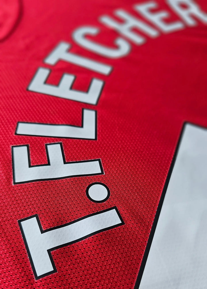 Close-up view of the name &