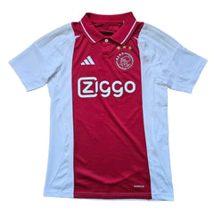 Back view showcasing the red jersey with Ziggo sponsor, Ajax crest, and two stars above.