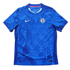Back view showing Chelsea crest and Nike logo in blue with tonal pattern.