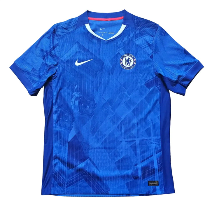 Back view showing Chelsea crest and Nike logo in blue with tonal pattern.
