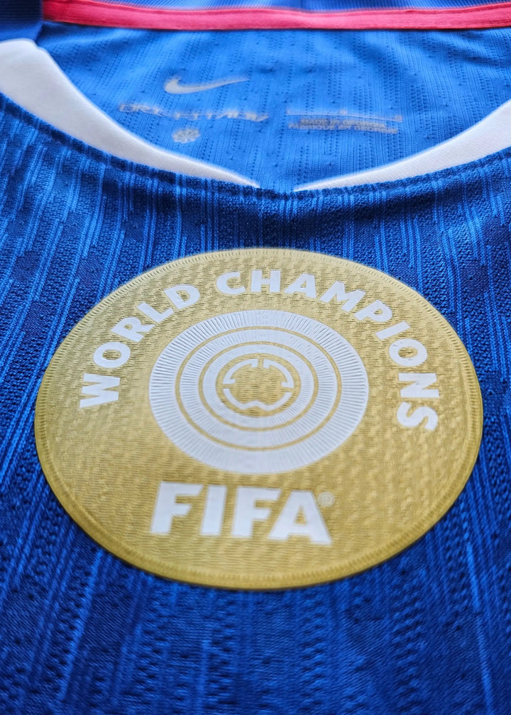 Crest detail featuring the gold &