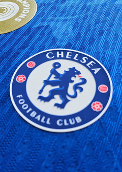 Crest detail showing Chelsea Football Club's logo with blue lion and red accents.