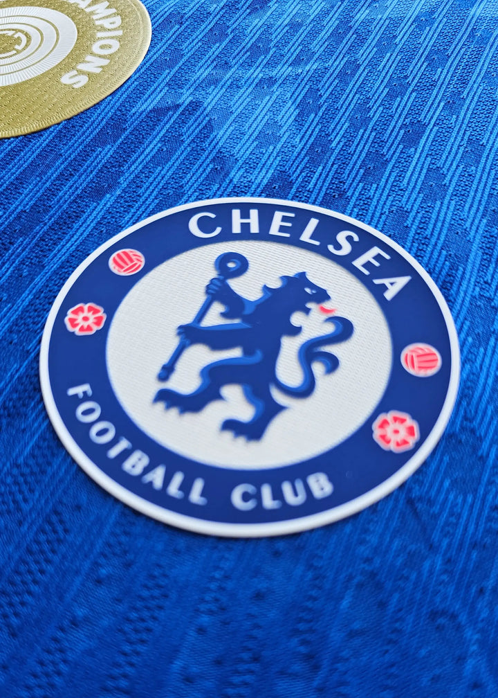 Crest detail showing Chelsea Football Club's logo with blue lion and red accents.