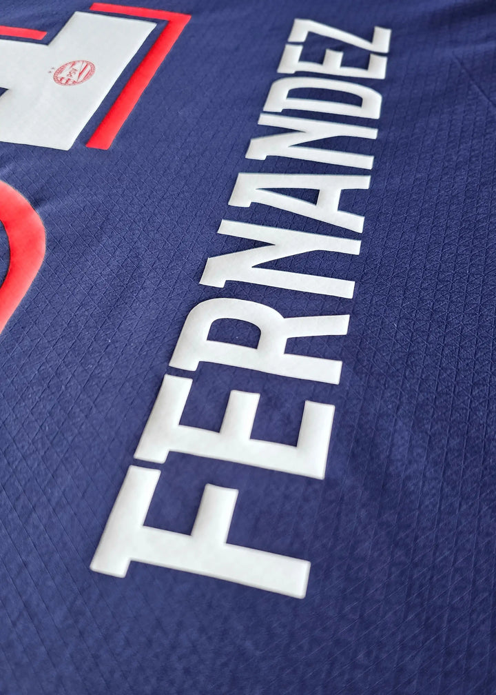 Back view showing No. 31 and FERNANDEZ in white lettering with navy background.
