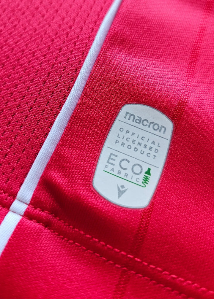 Detail view highlighting the official Macron label, indicating licensed product and ECO fabric.