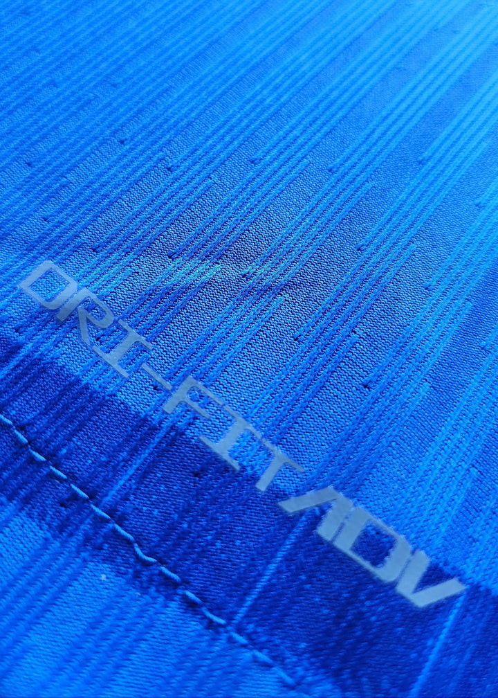 Close-up view showing the DRIFT-FIT ADV text on the blue fabric.