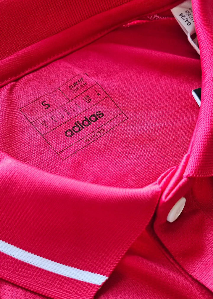 Label showing size S and slim fit, with adidas branding and white detailing at the collar.