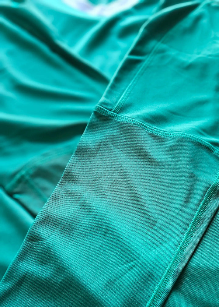 Close-up view of the fabric texture and stitching details of a signed Gianluigi Donnarumma football shirt.