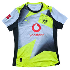 Back view showcasing Borussia Dortmund crest with two stars and Vodafone sponsor logo.
