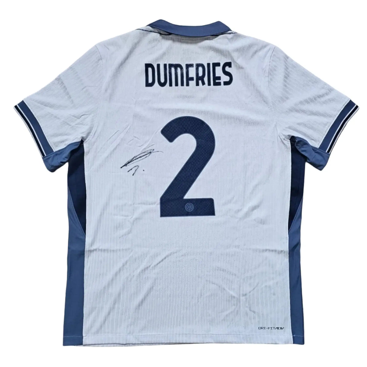 Back view showing the name DUMFRIES and No. 2, along with a visible signature.