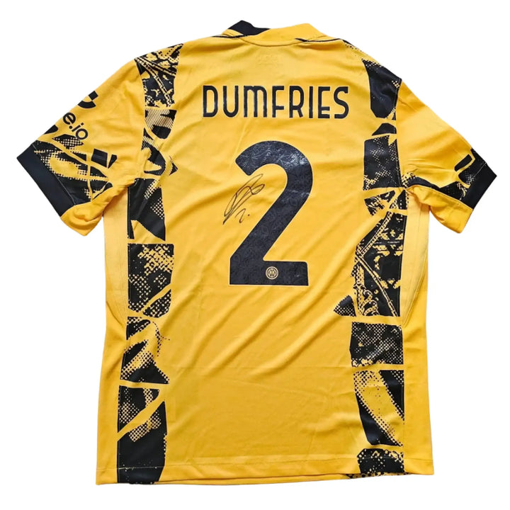 Back view showing the name DUMFRIES, number 2, and a visible signature in black on a yellow football shirt.