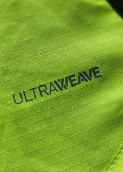 Close-up showing the 'ULTRAWEAVE' detail on the bright yellow fabric texture.