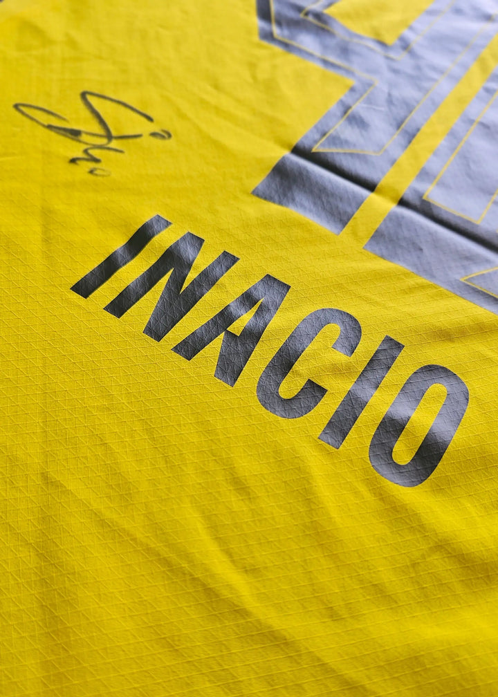 Back detail featuring signature and name &