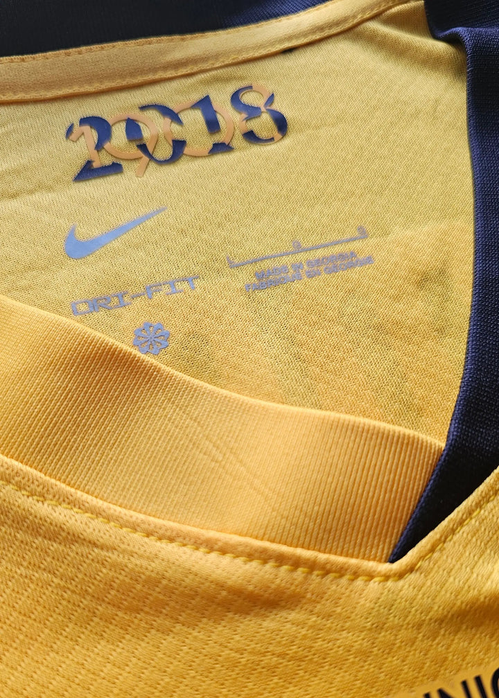 Close-up of the collar showing the text '2018', Nike logo, and DRI-FIT label.
