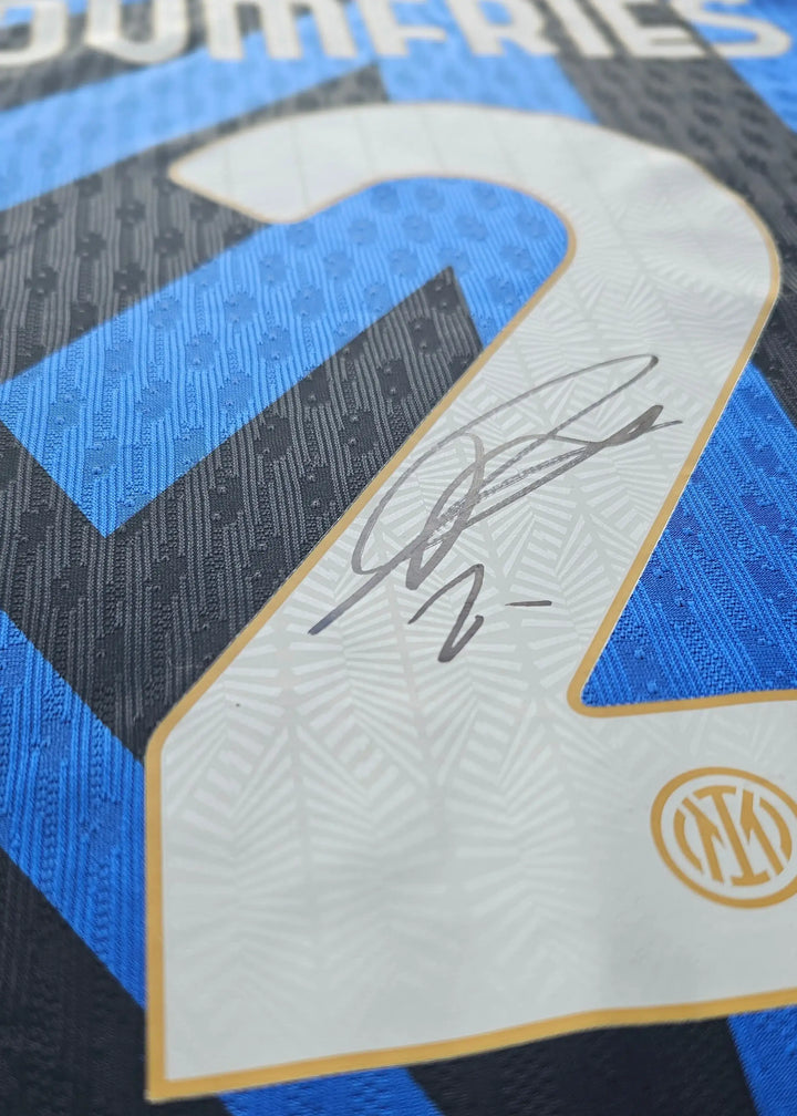 Signature of Denzel Dumfries on the No. 2 shirt featuring Inter Milan crest.