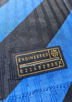 Close-up view of the tag displaying 'ENGINEERED' and the number '82148390R'.