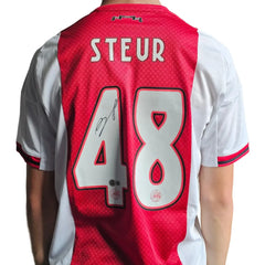 Back view showing player name Steur, No. 48, and a visible signature.