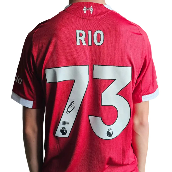 Back view showing player name 'RIO' and number '73' on a red football shirt.