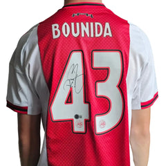 Back view displaying Bounida, No. 43, with a visible signature on the red and white design.