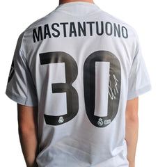 Back view displaying Mastantuono, No. 30, and a visible signature on a white football shirt.