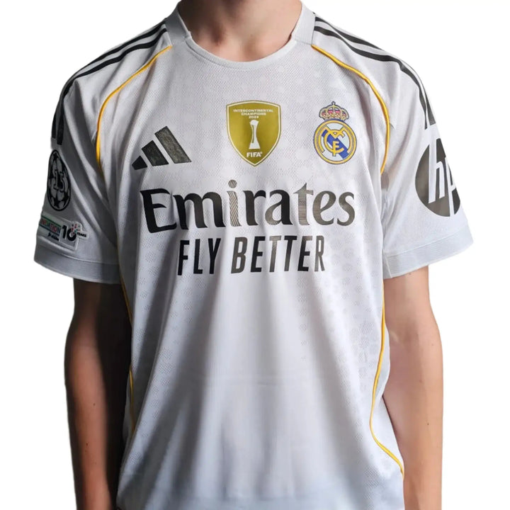 Front view of signed Real Madrid football shirt featuring the Emirates logo and FIFA badge.