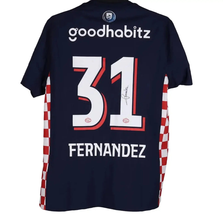 Navy sports shirt with number 31, name 'Fernandez', and sponsor 'goodhabit' on a gray background