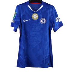 Front view featuring Chelsea crest, FIFA World Champions badge, and Nike branding on a blue football shirt.