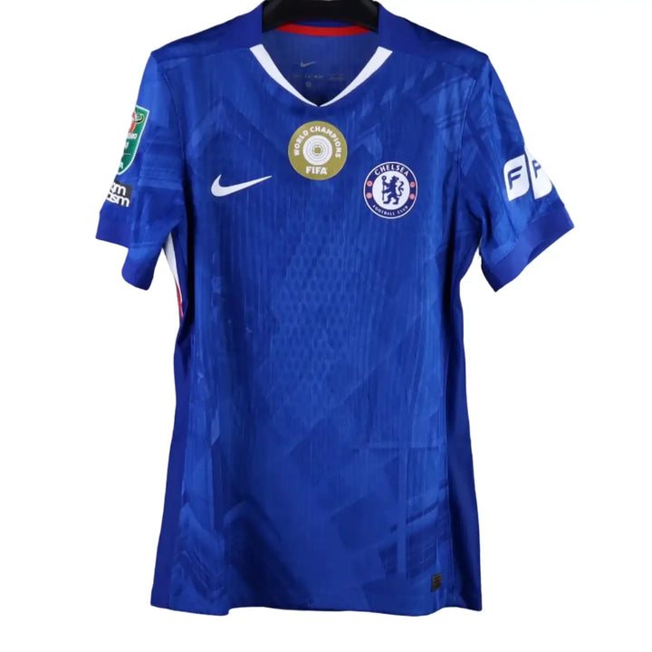 Front view featuring Chelsea crest, FIFA World Champions badge, and Nike branding on a blue football shirt.