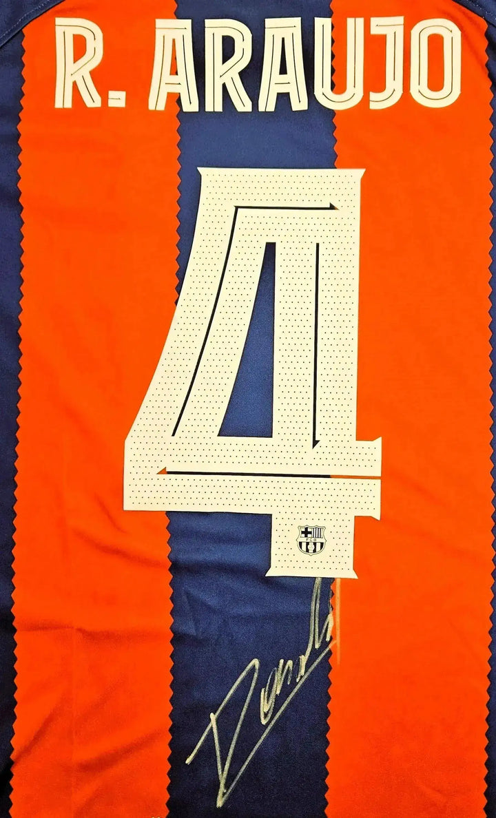 Back view showing R. ARAUJO and No. 4 with a visible signature.