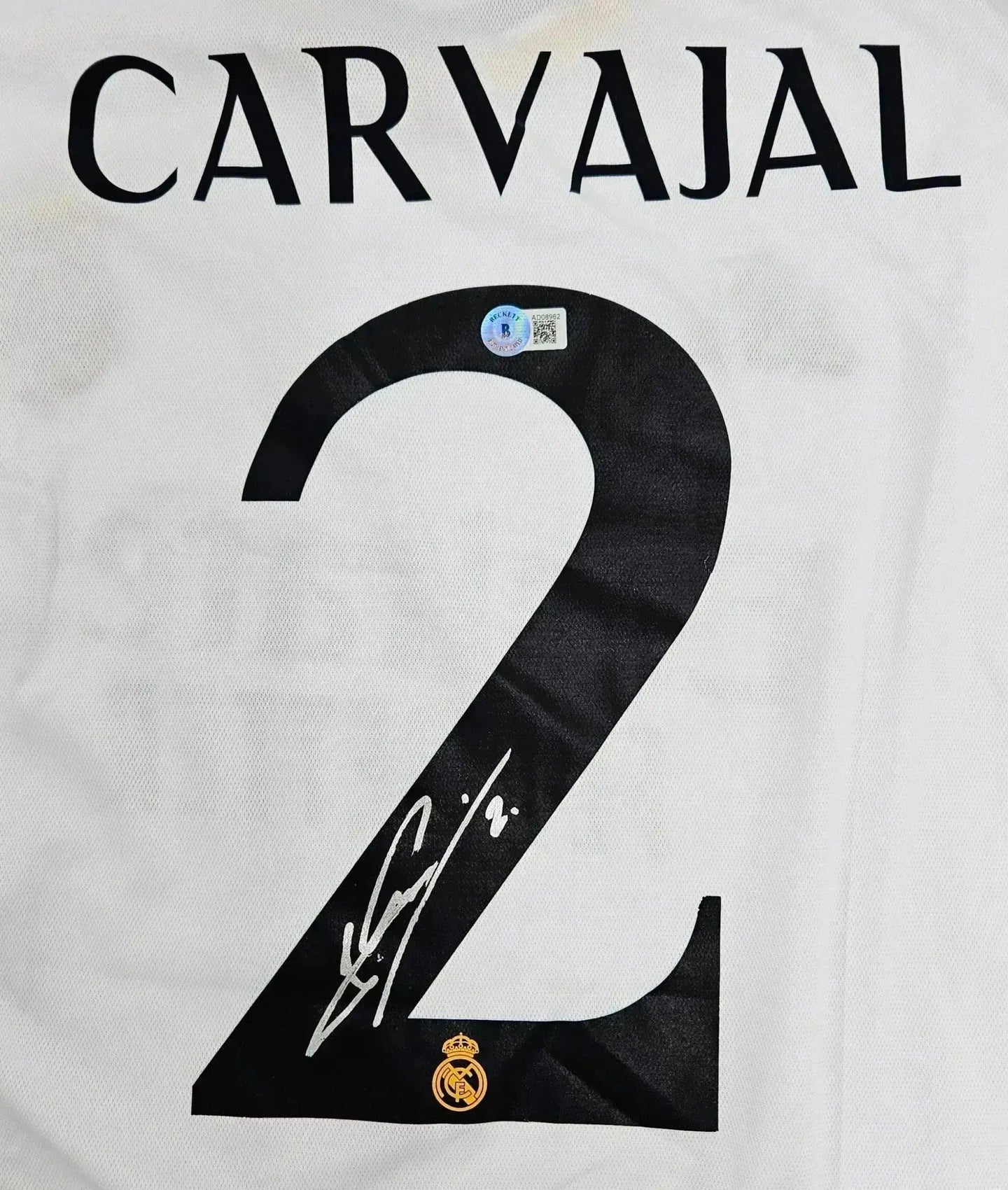 Back view featuring the name CARVAJAL, No. 2, and a signature with Real Madrid crest.