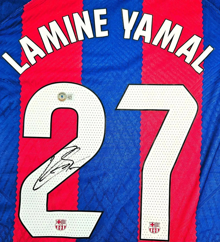 Back view showing Lamine Yamal, No. 27, and a visible signature.