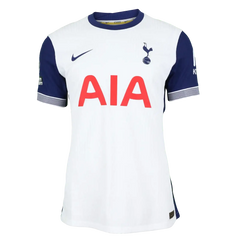 Front view of white Tottenham Hotspur football shirt featuring AIA sponsor and embroidered club crest.