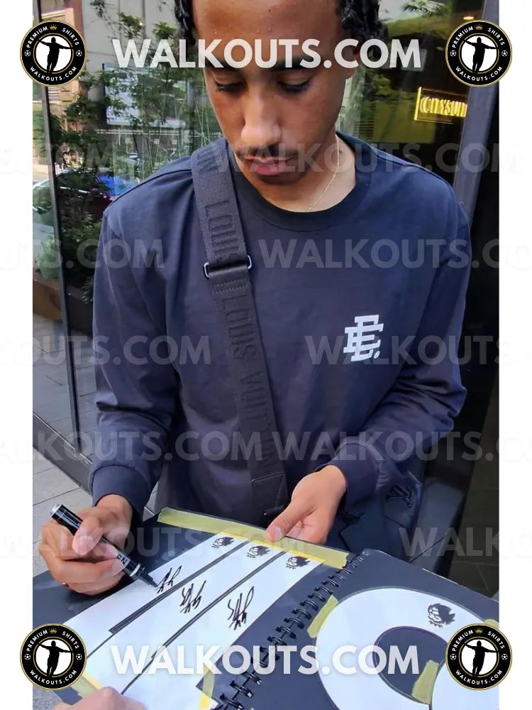 Signing proof photo for Leny Yoro (Manchester United F.C.) — 2024-2025 • #24LYO20013115