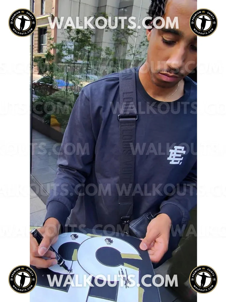Signing proof photo for Leny Yoro (Manchester United) — 2024-2025 • #24LYO20013015