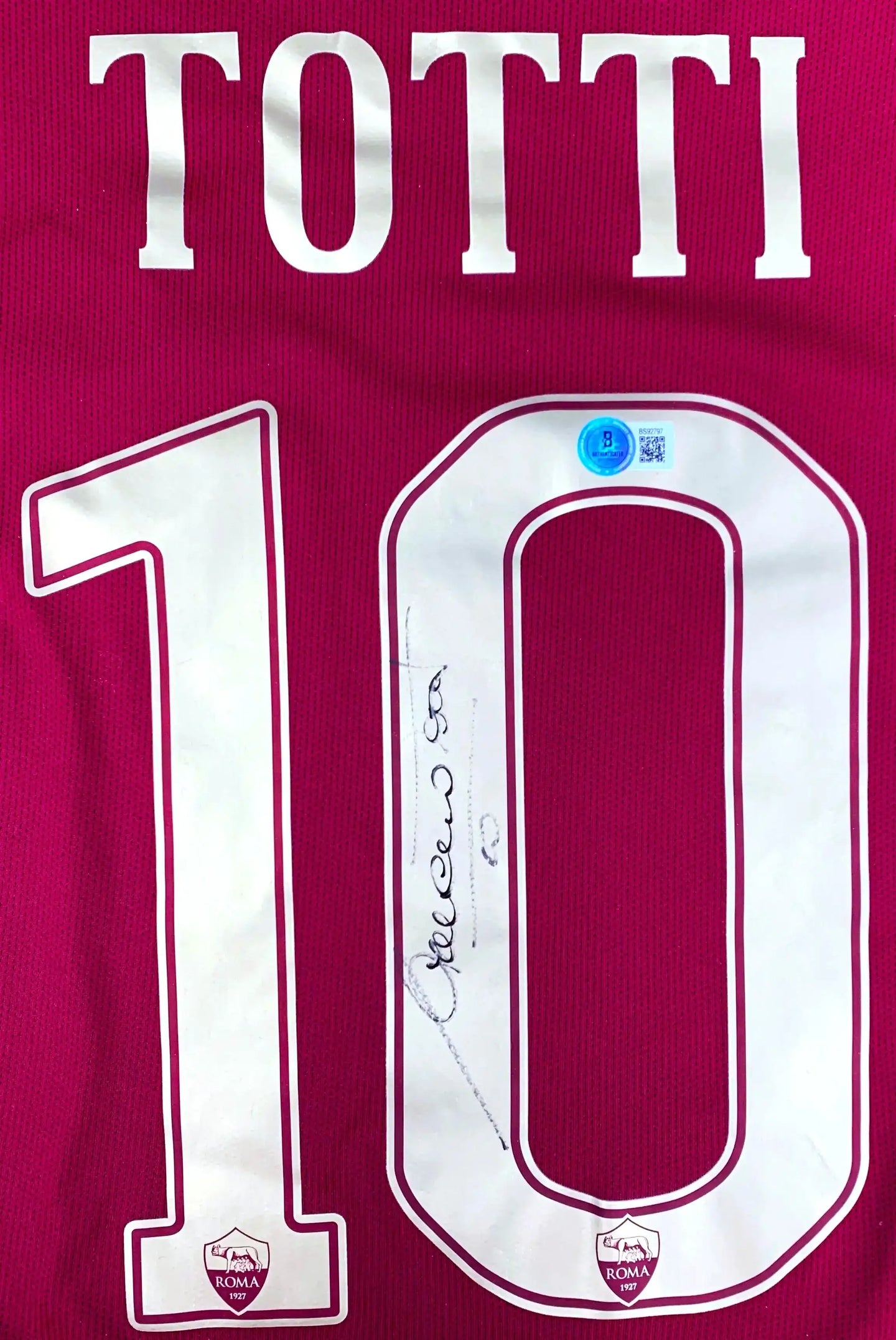 Back view showing Totti, No. 10, with a visible signature and club badge.
