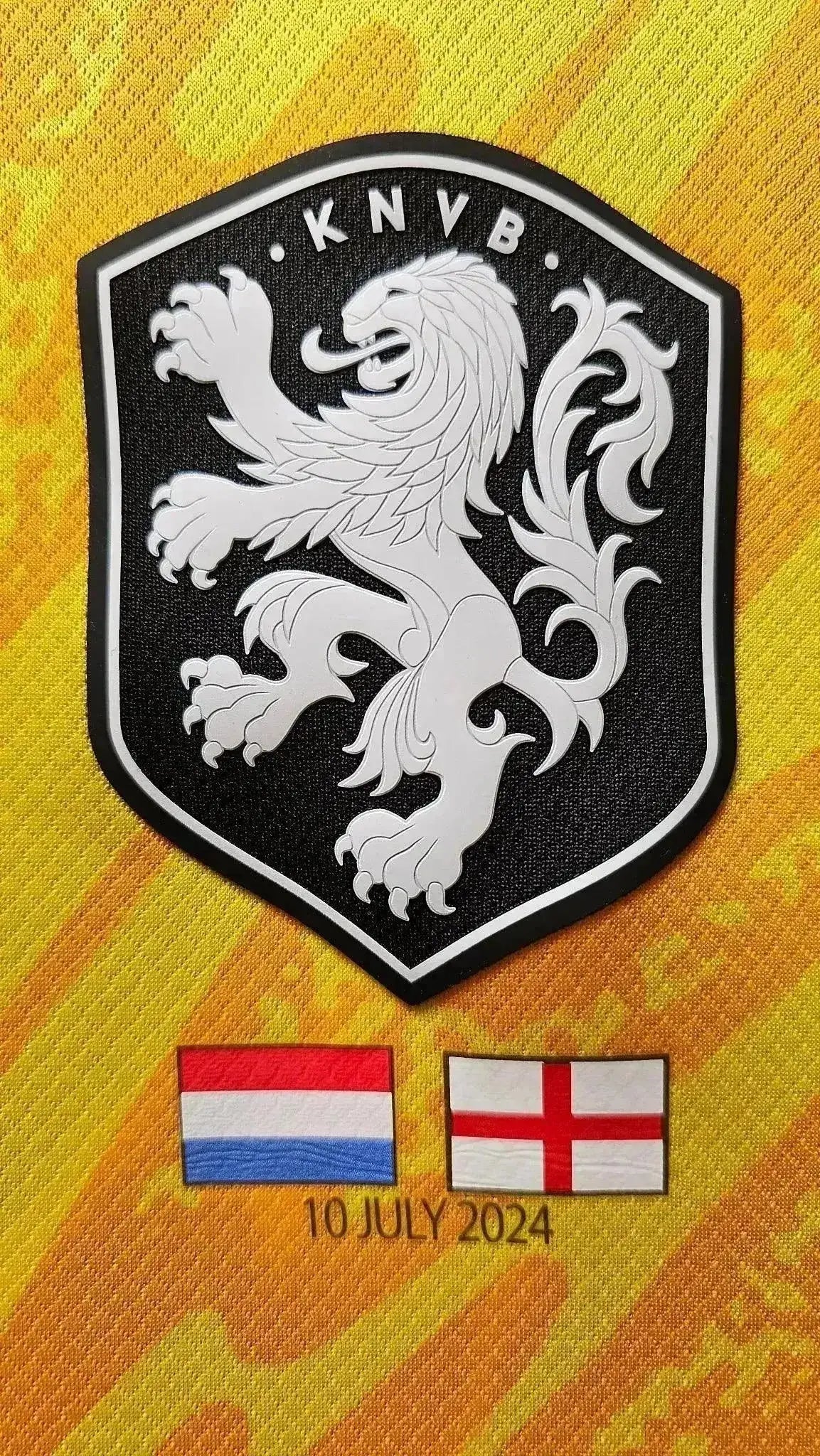 Crest detail featuring KNVB badge, Netherlands and England flags, and date 10 July 2024.