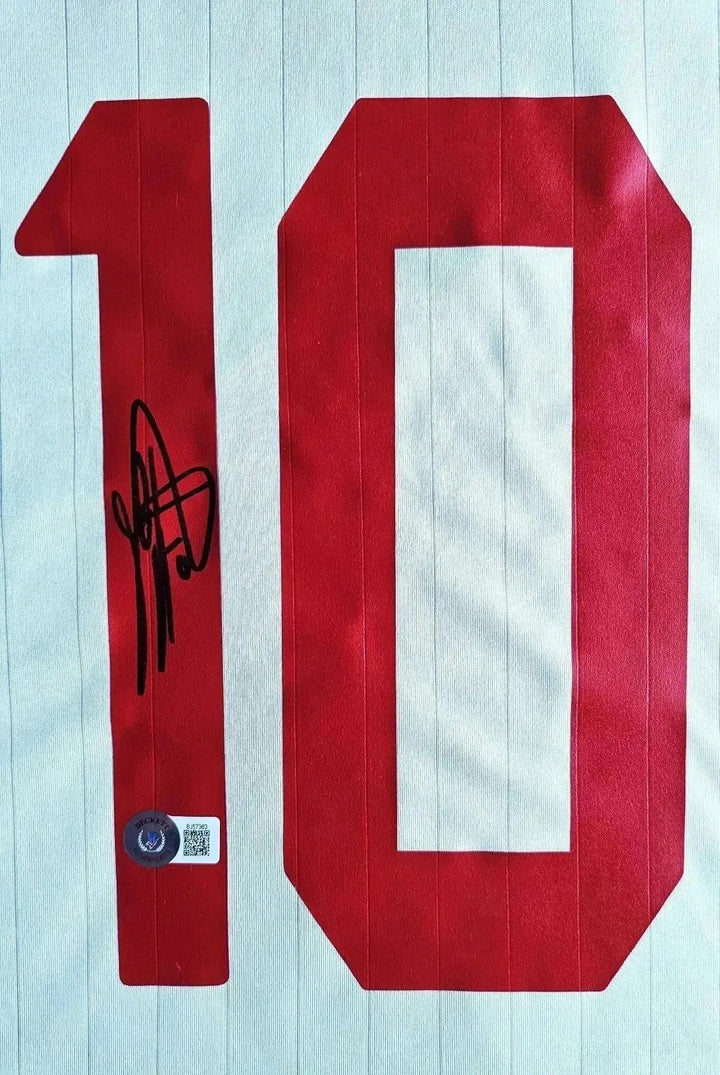 Detail showing No. 10 with signature on AC Milan 2006-07 football shirt.