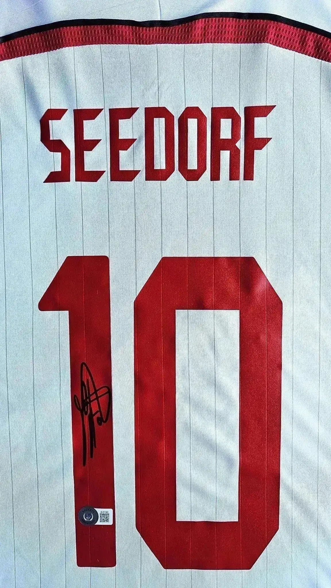 Back view showing Seedorf, No. 10, and a visible signature.