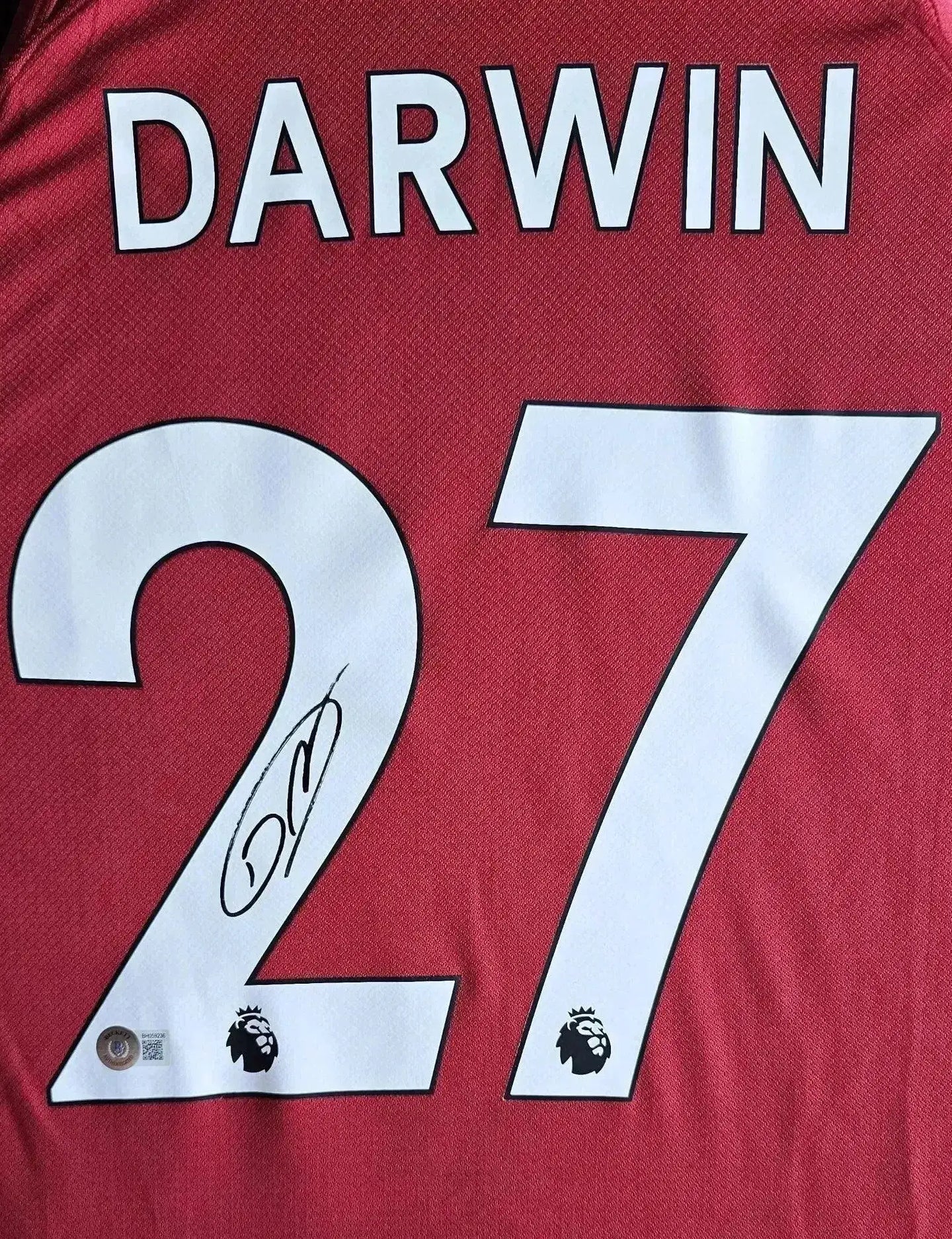 Back view displaying 'DARWIN' and No. 27 with a visible signature and Premier League logo.