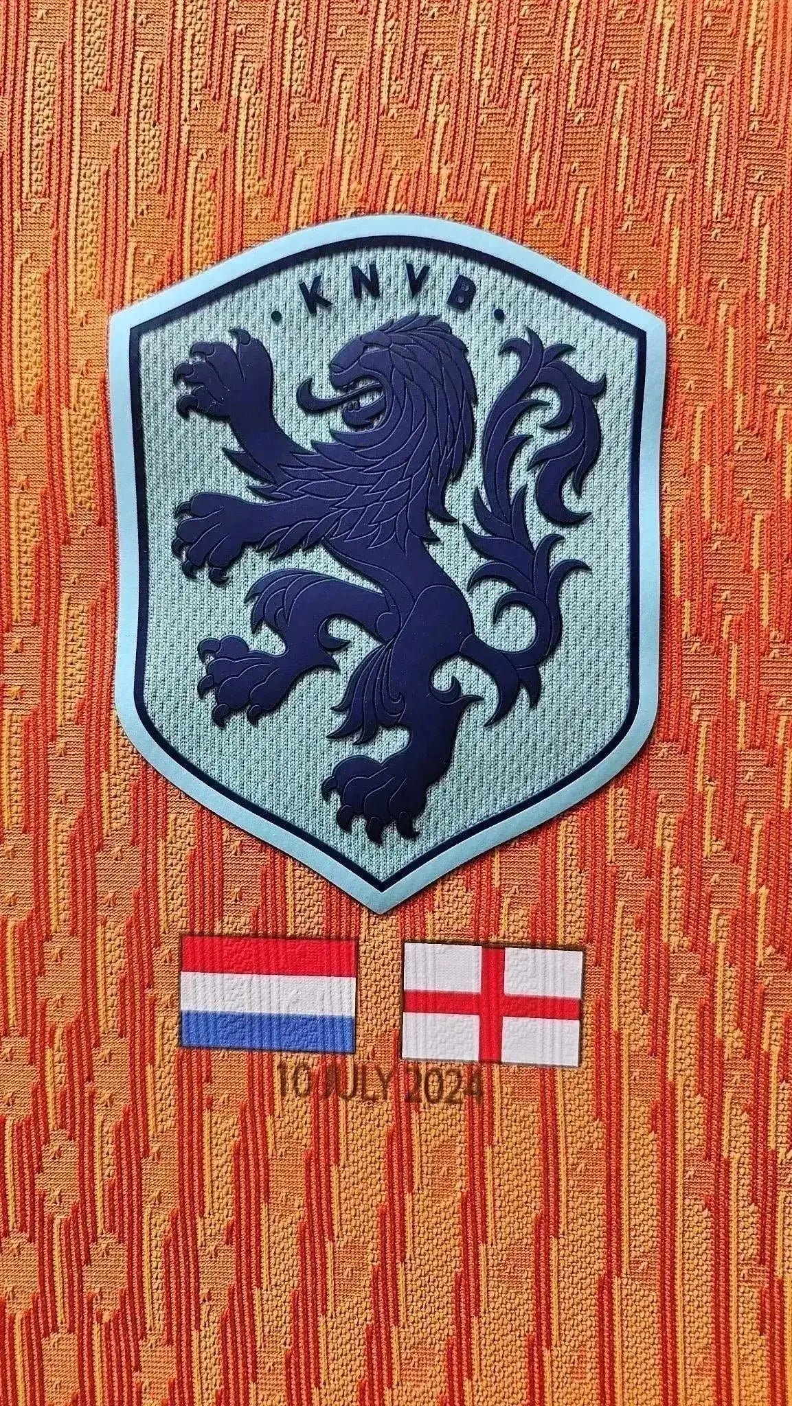 Close-up of the Netherlands crest with lion emblem, flags, and date '10 JULY 2024'.