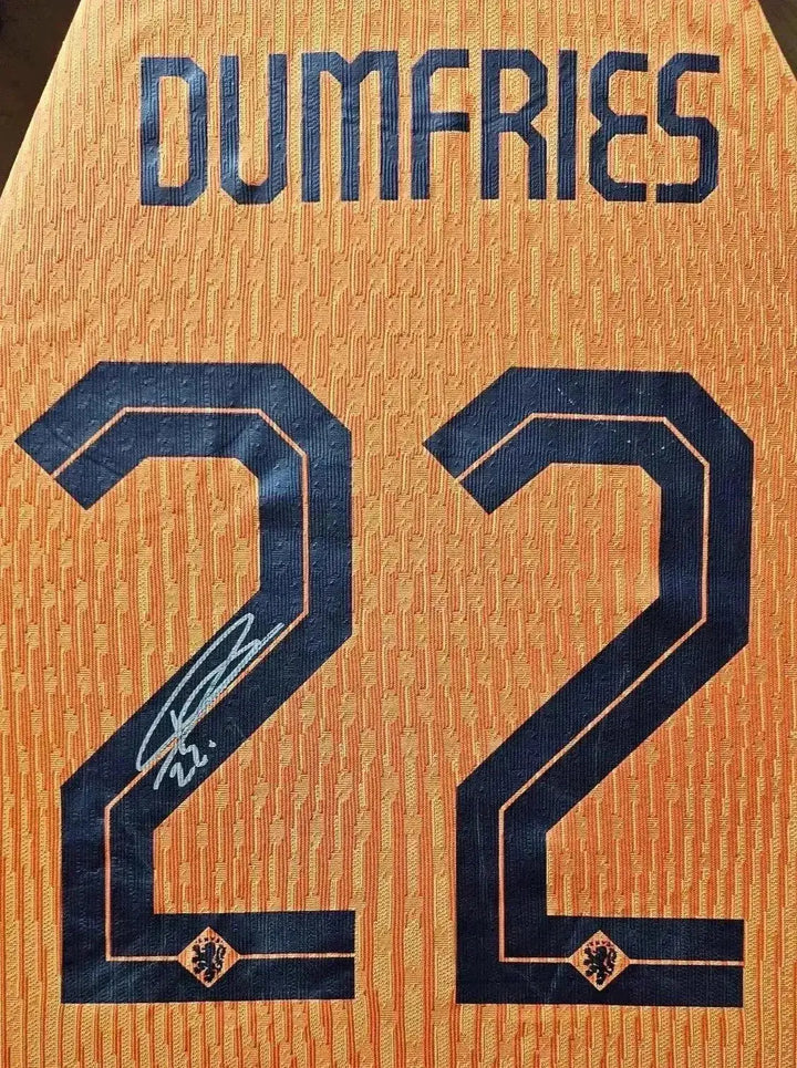 Back view showing Dumfries, No. 22, and visible signature in black ink.