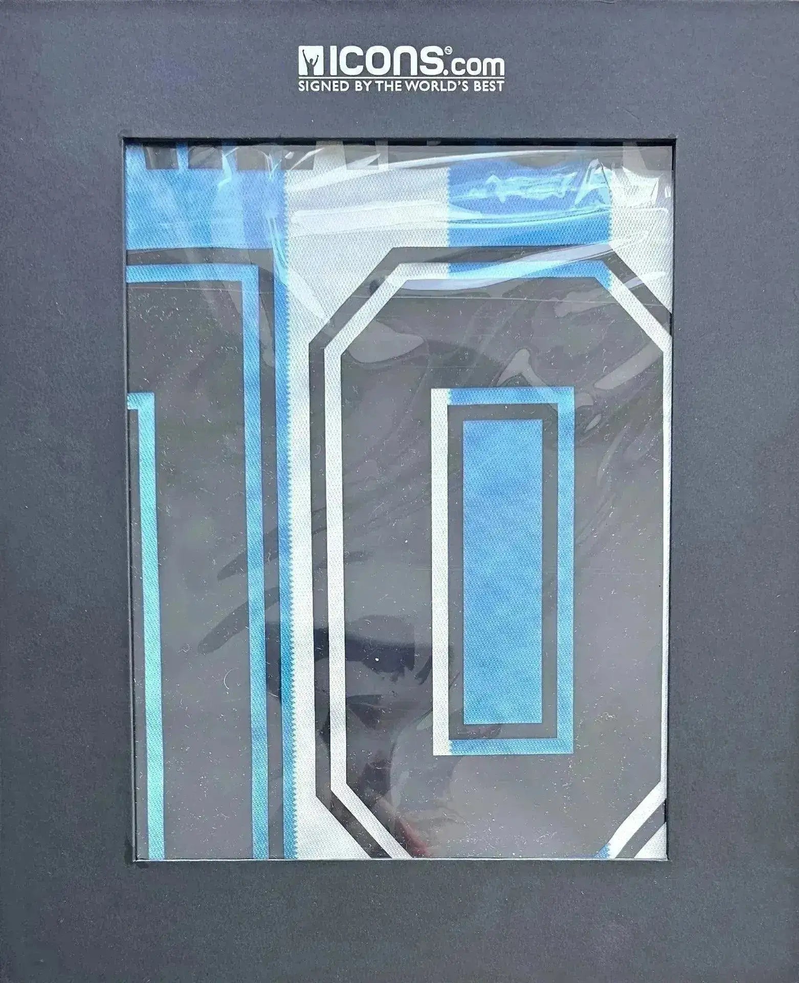 Number 10 featuring blue and black accents in a display case signed by Diego Maradona.