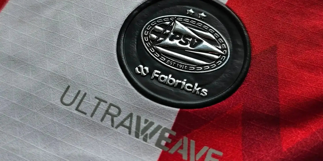 Fabric label with 'Fabrics' branding on a red and gray background