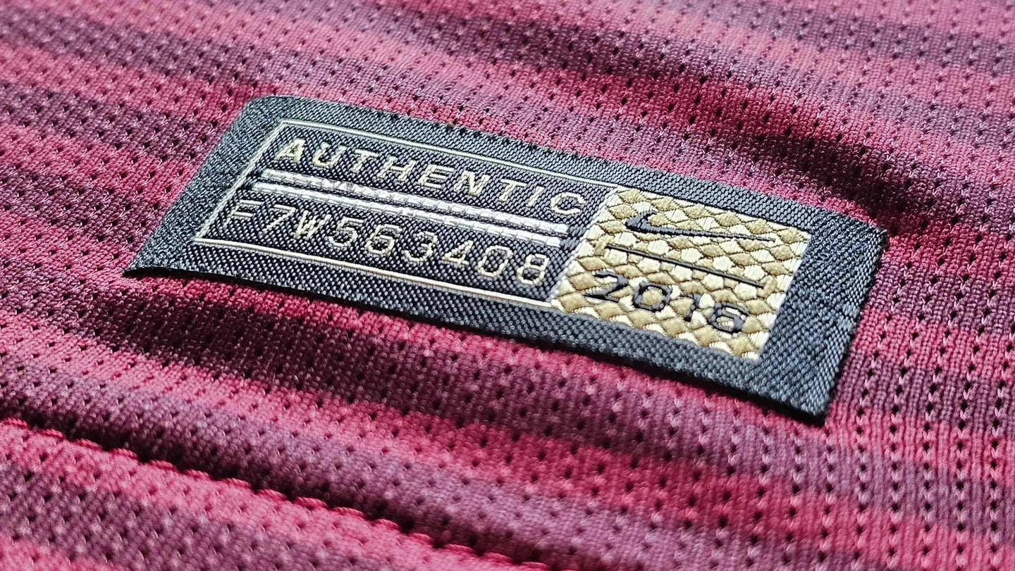 Close-up of the authenticity tag showing AUTHENTIC, F7W553408, NIKE, and 2016.