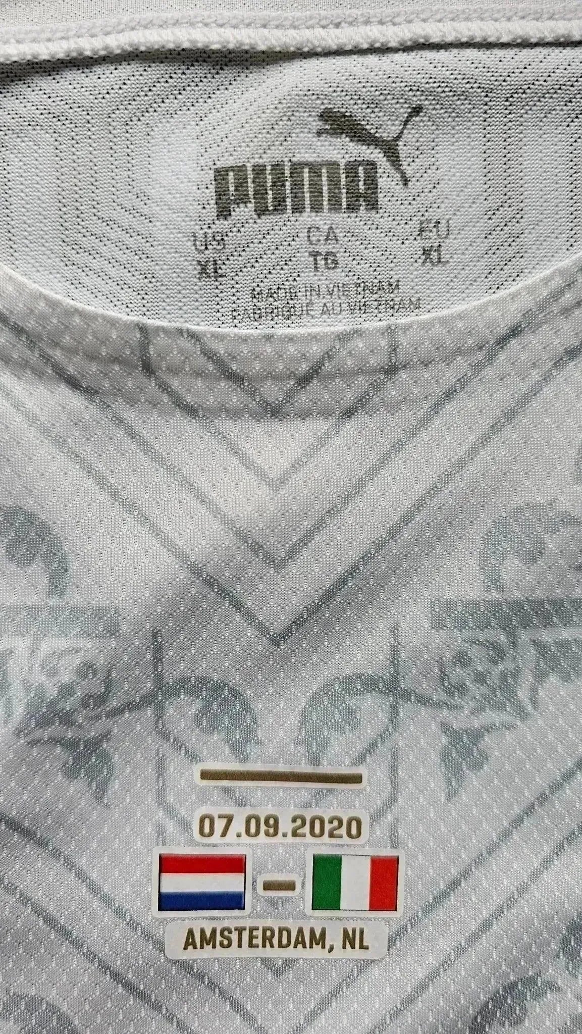 Collar detail showing Puma logo and care labels, with match details: 07.09.2020, Amsterdam, NL.