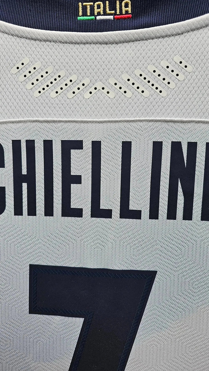 Back view showing Chiellini, No. 3, and Italia detail just above the collar.