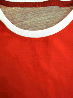 Neckline detail showing white trim of Johan Cruyff 14 Ajax signed soccer jersey.