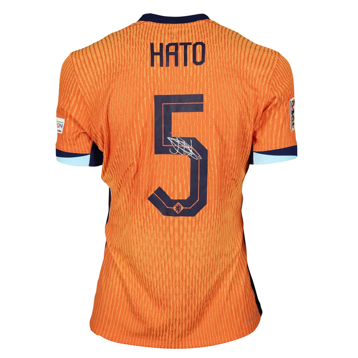 Back view showing player name HATO, number 5, and signature in orange football shirt.