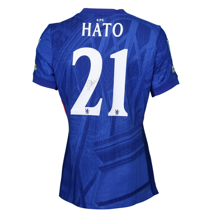 Back view displaying No. 21 and HATO with a visible signature on a blue Chelsea F.C. shirt.